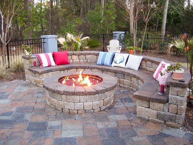 Fire Pit Gardenfrontier A modern stone fire pit sitting in a landscaped garden