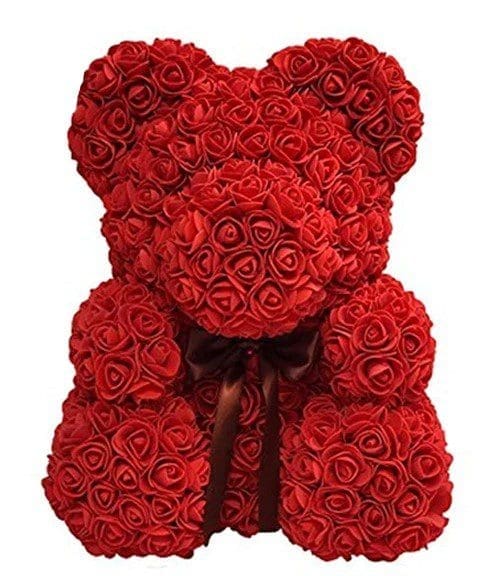 Flower Bear Gift Guide Gardenfrontier Pink flower bear made from artificial roses displayed in a clear gift box