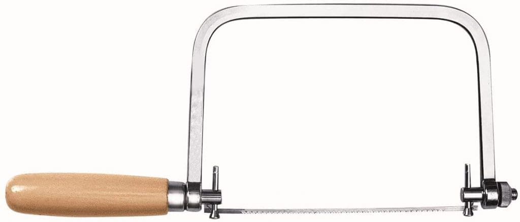 Coping Saw Gardenfrontier Professional coping saw with a U shaped steel frame on a wooden workbench