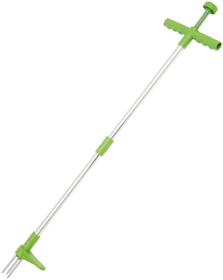 Long handled weed puller Gardenfrontier A gardener using a long handled weed puller tool